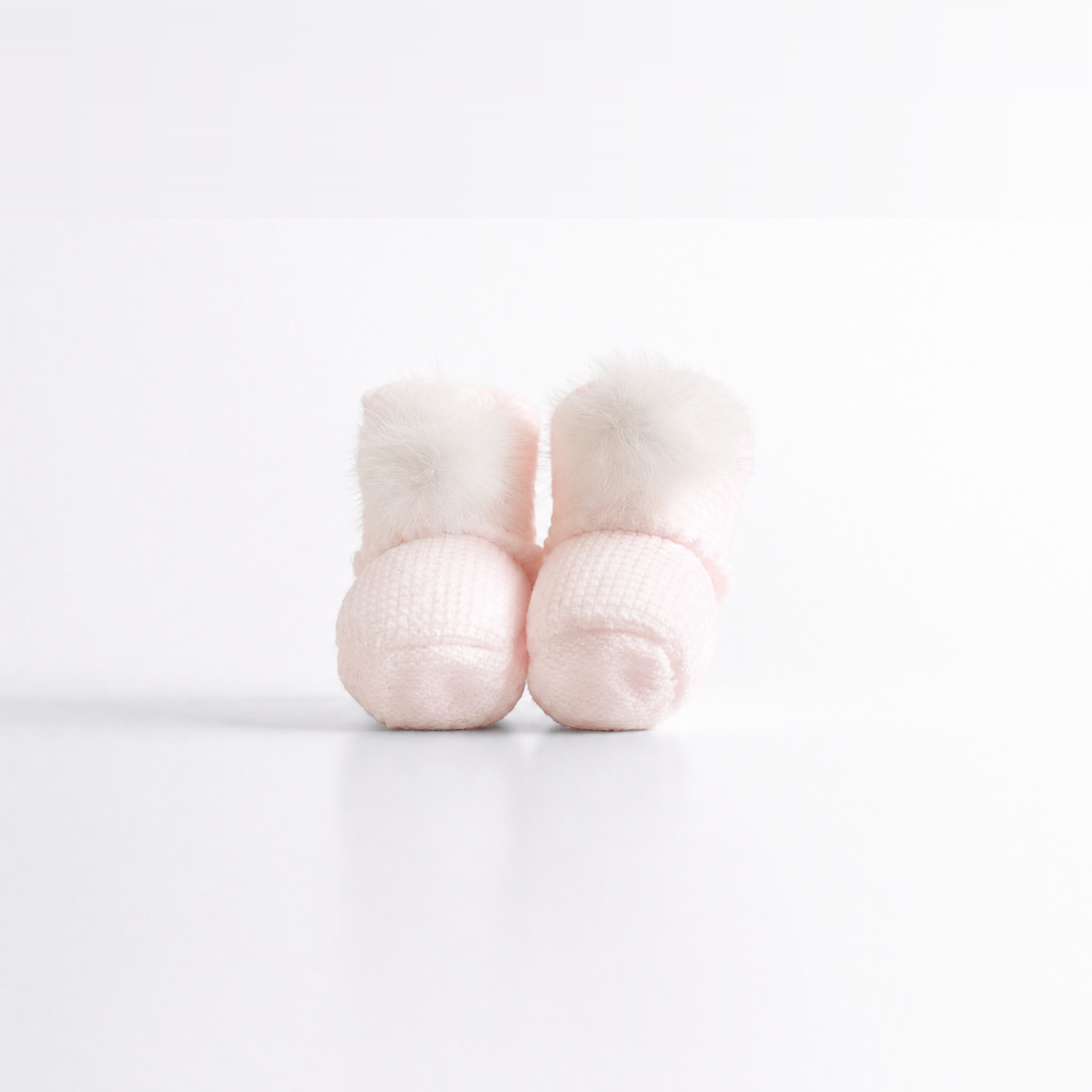 BOTITAS POMPON ROSA BEBE