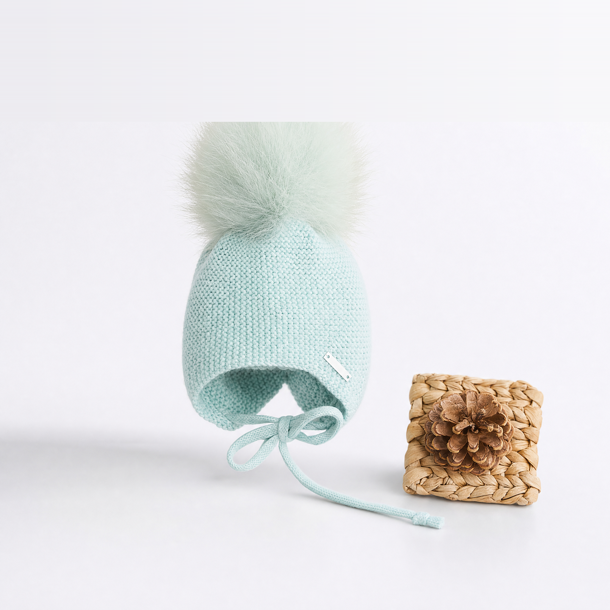 GORRO OREJERO-AÑADIR POMPON VERDE MINT