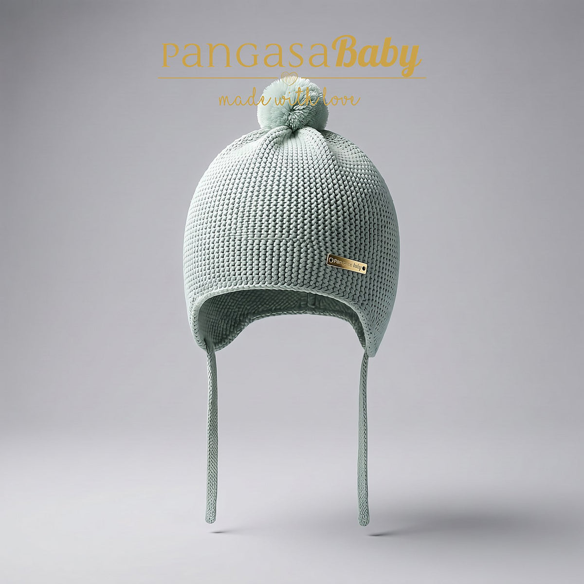 GORRO OREJERO BEBE PUNTO CON POMPON PUNTO VERDE MINT